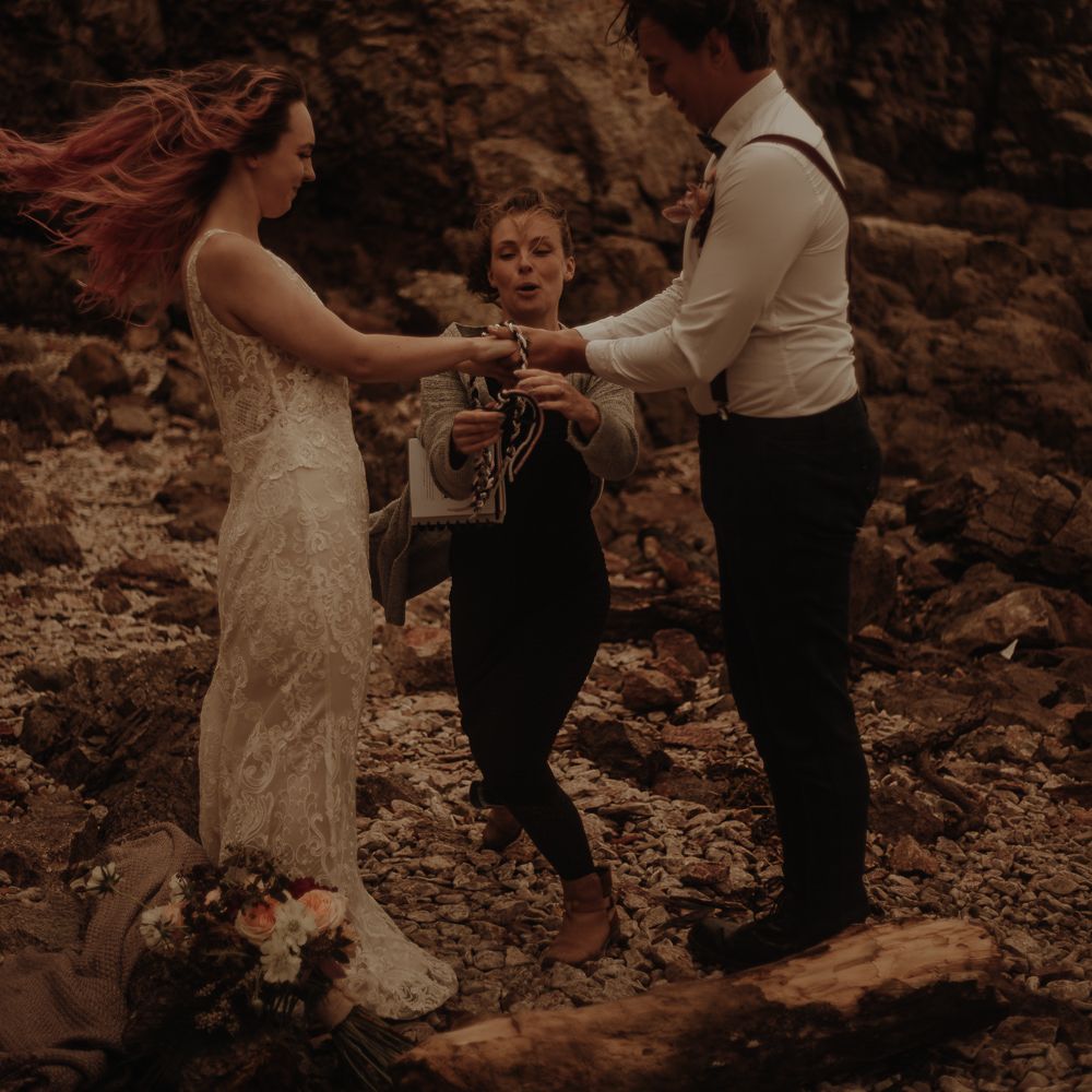 Hand fastening at intimate wedding