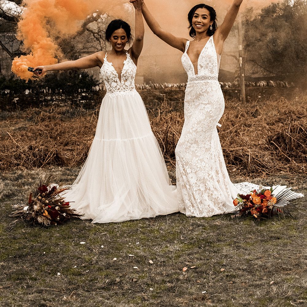 Orange smoke grenade for farm wedding venue portrait 