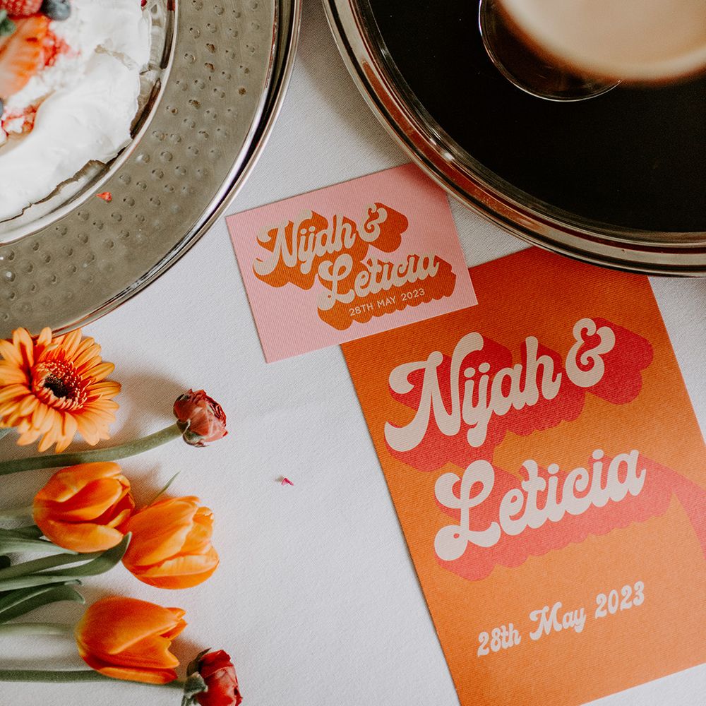 Retro wedding invitations with bold font and vibrant orange, yellow and pink colour scheme 