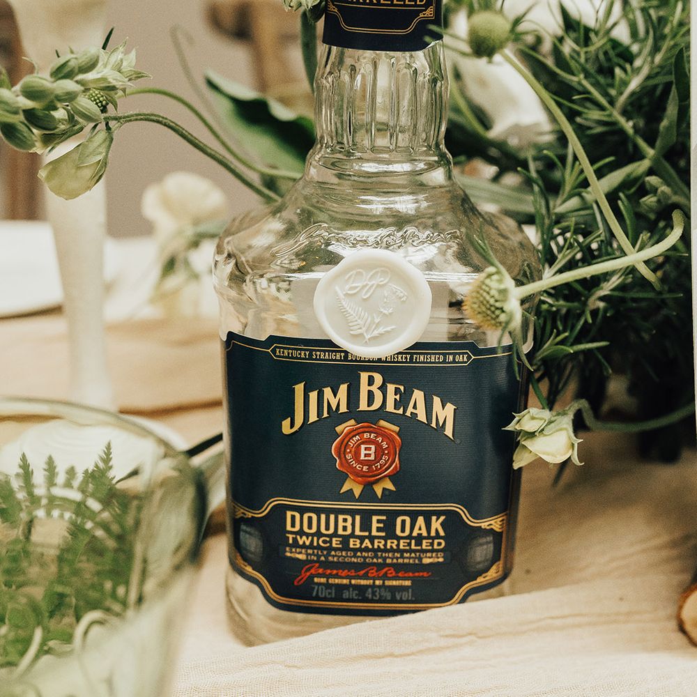 Whiskey bottles at luxury Southern Tennessee themed wedding 