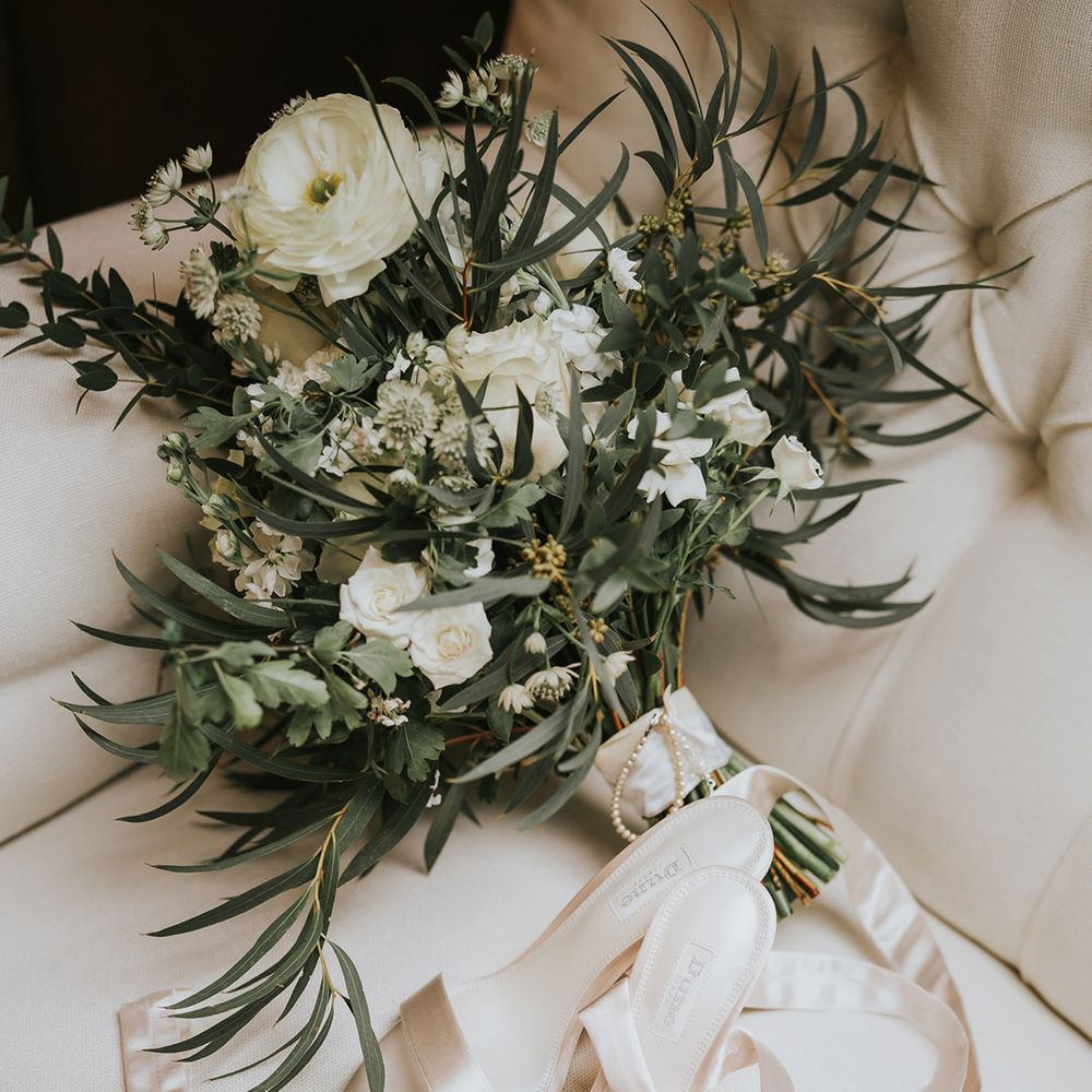 White flower bridal bouquet with white satin ribbon wedding heels 