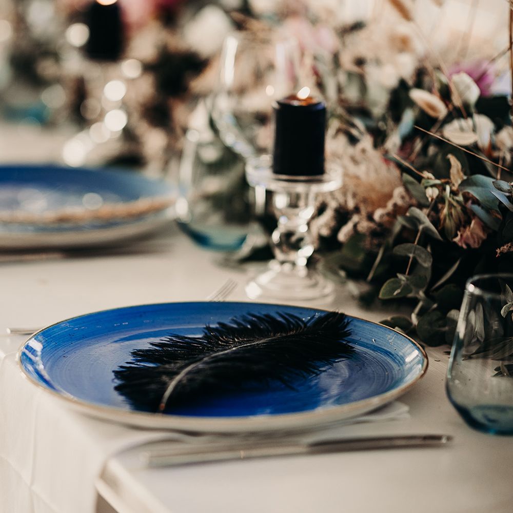 Blue details on wedding table with blush flower table runner