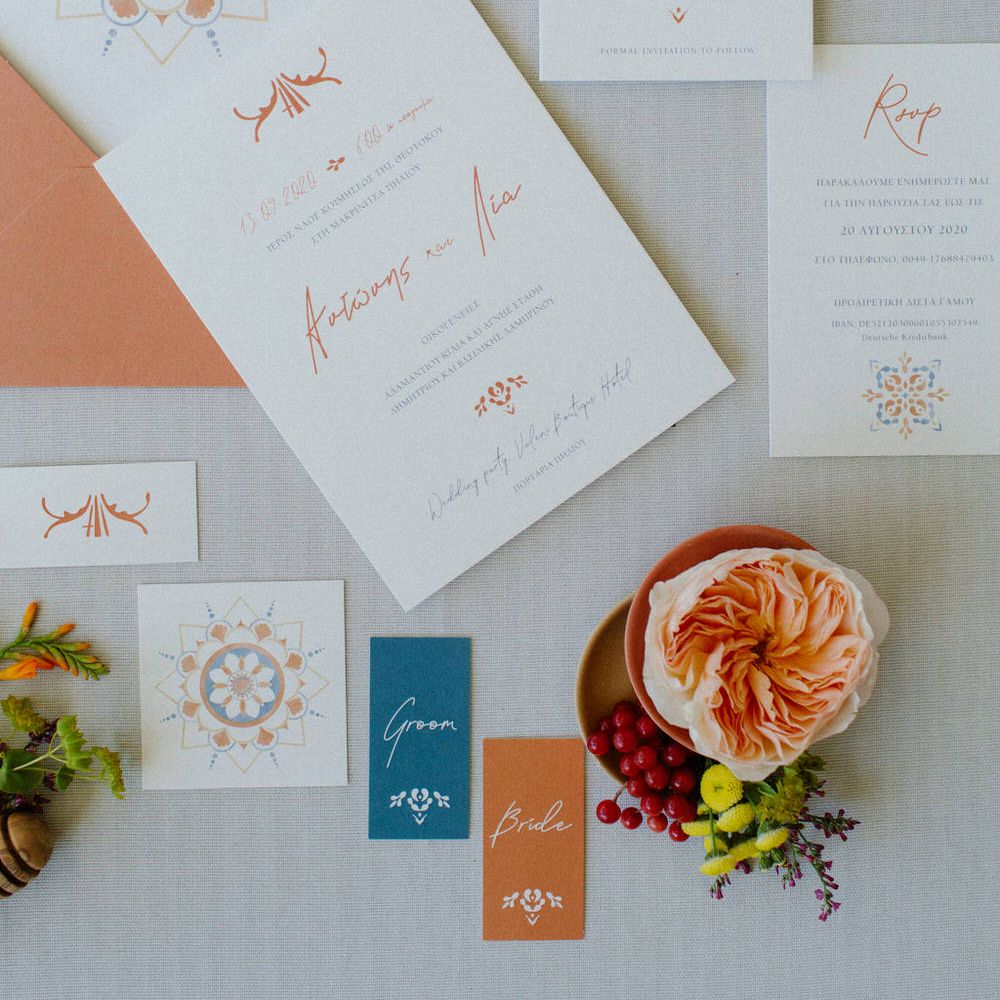 Minimal and traditional Greek wedding stationery with tile detailing