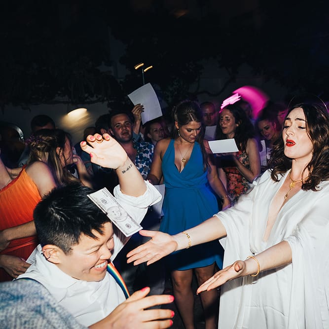 Brides dance outside for wedding reception in Menorca