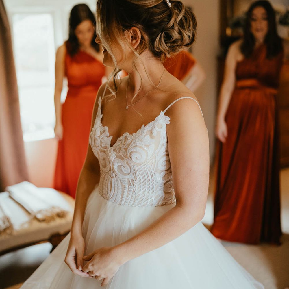 Bride in Blush by Hayley Paige wedding dress with pearl hair pins 