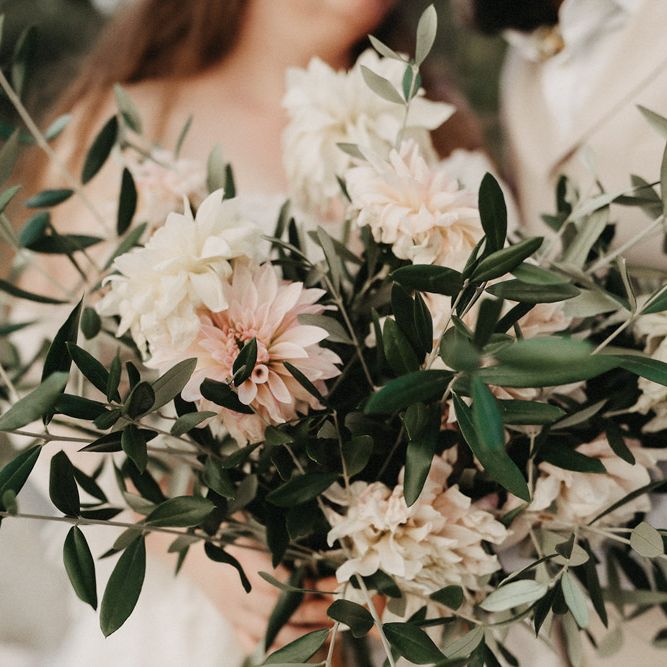 Close up of beautiful olive bouquet, olive branches and dahlia flowers