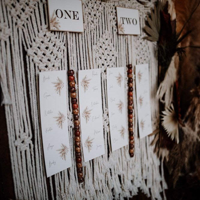 Macrame wedding table plan for boho barn wedding 