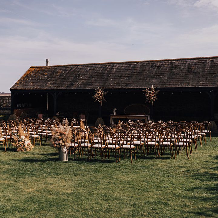 Barn wedding with Pampas grass installation 