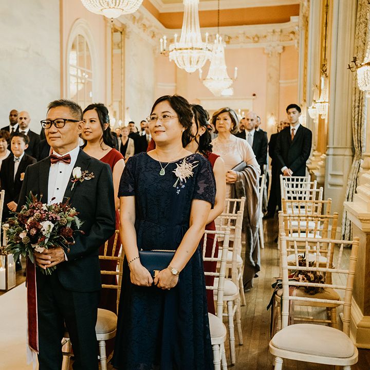 Wedding guests during civil ceremony at Danesfield House
