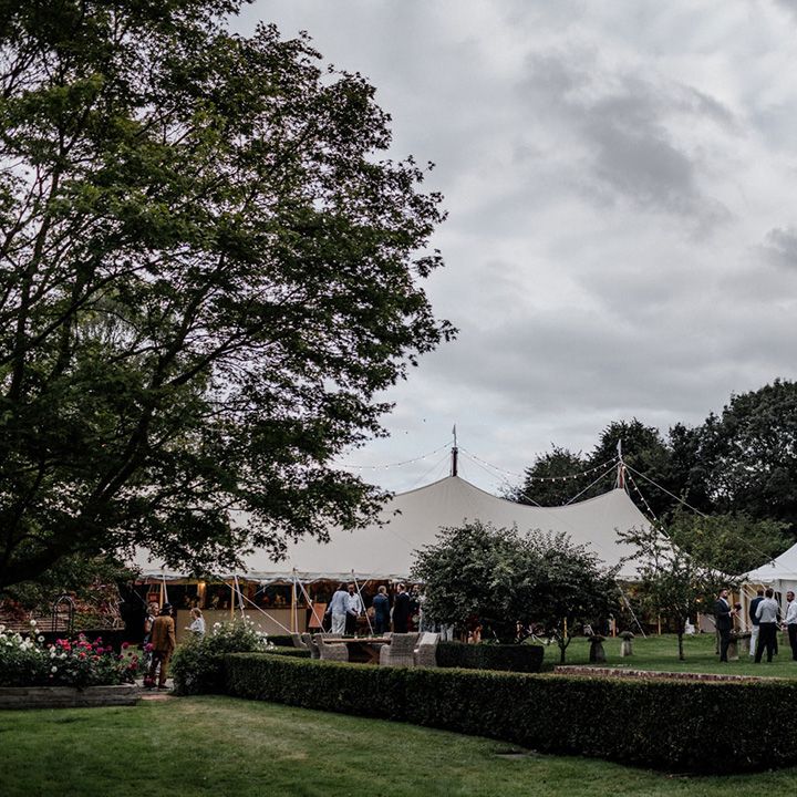 stretch tent tipi wedding at the bride's parents garden 