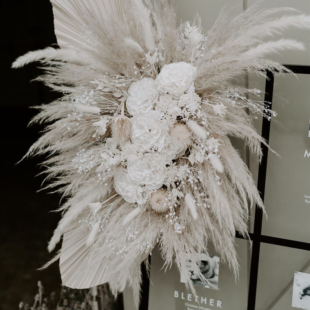 Dried white flower wedding decoration with white pampas grass and bunny grass 