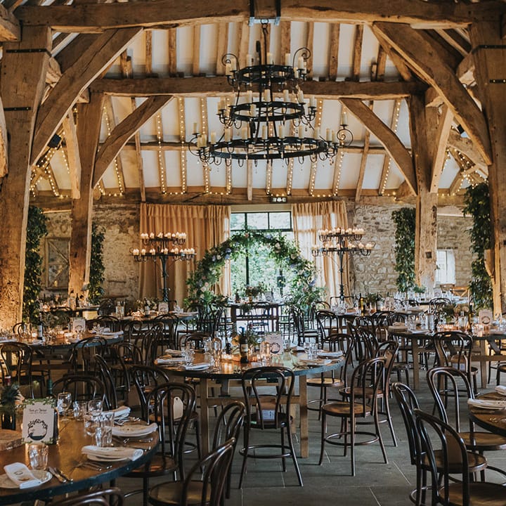 wedding reception room decorations at rustic barn wedding venue 
