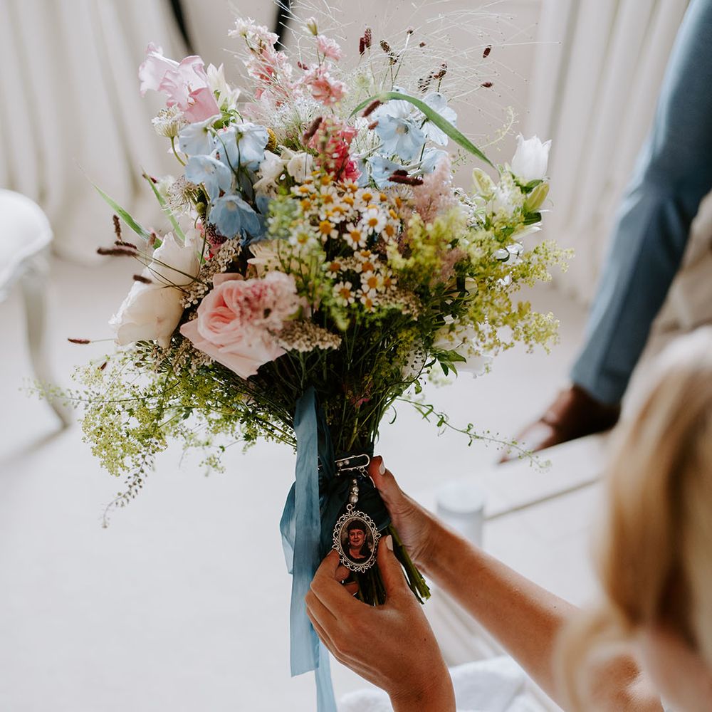 Pastel wildflowers wedding bouquet tied with blue ribbon and personalised charm and picture 