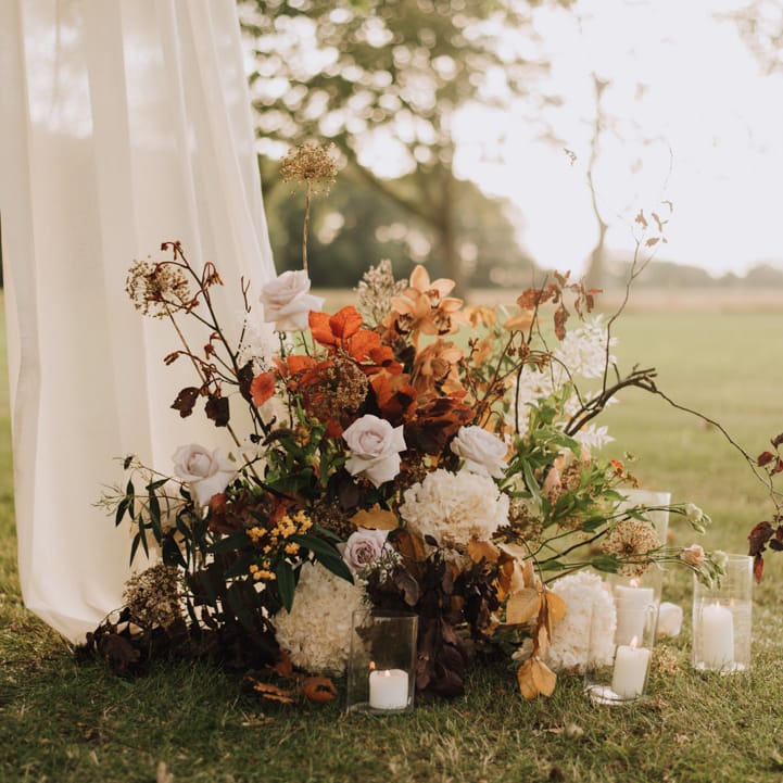 Outdoor wedding ceremony details at Reymerston Hall