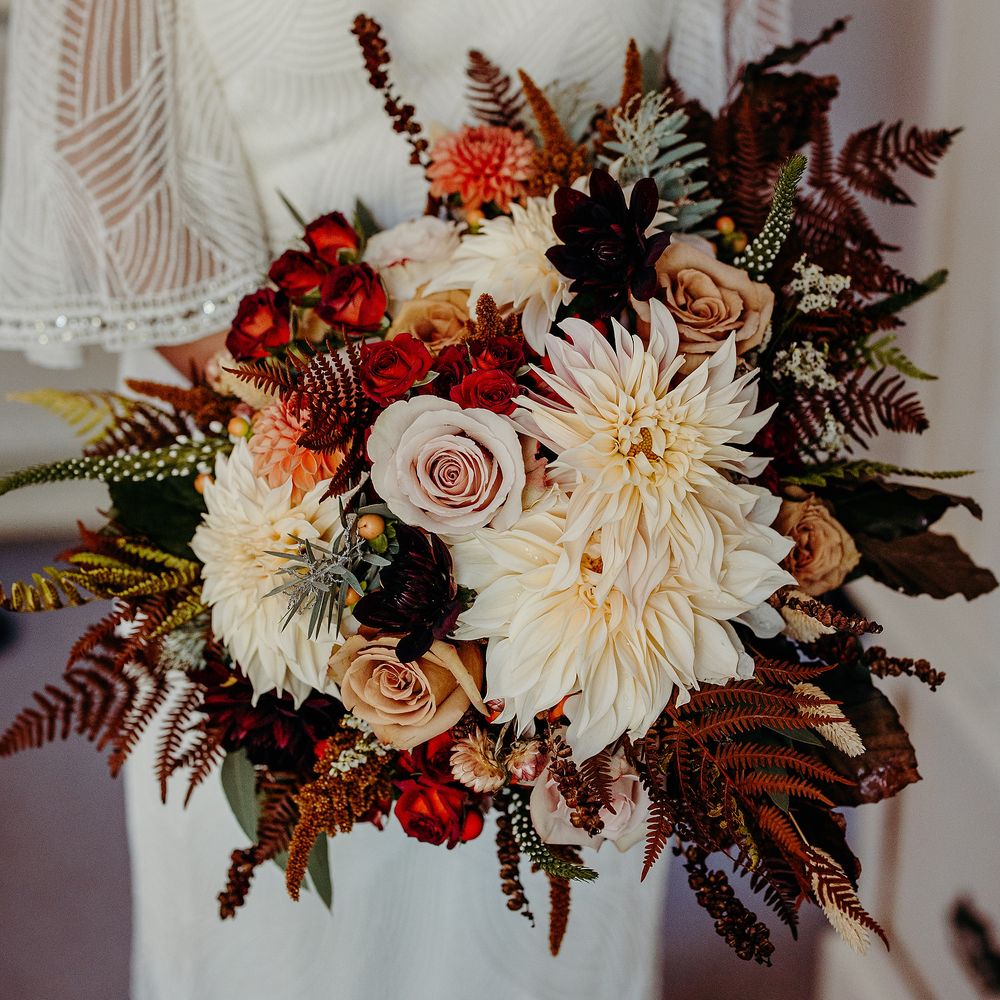 Autumnal bouquet with white and burnt orange florals