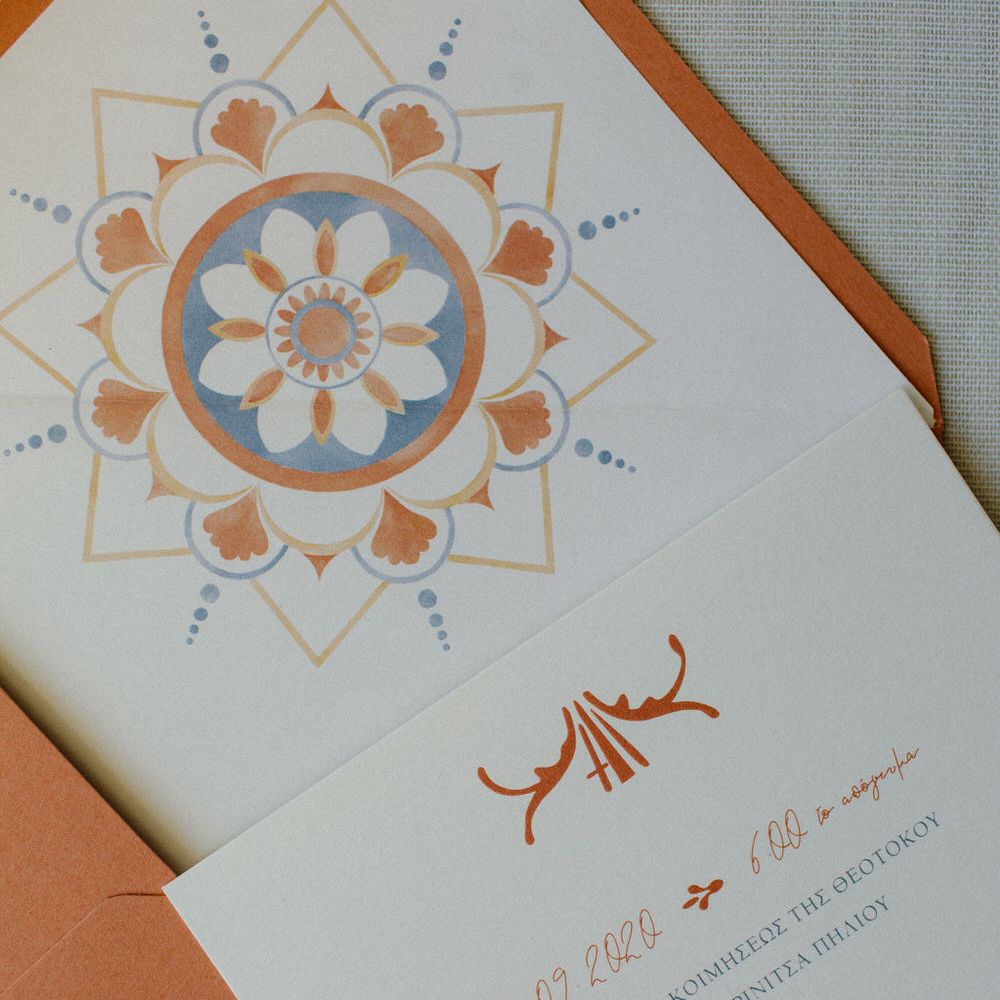 Wedding stationery with terracotta tile detailing