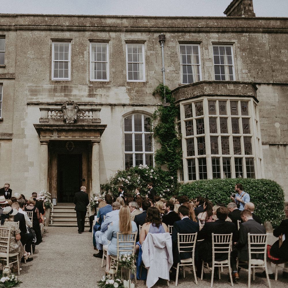 Elmore Court on the morning of wedding for outdoor ceremony in front of historic building with large doorway