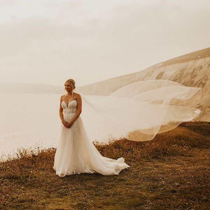 Bride in strapless wedding dress with sweetheart neckline at Isle of Wight wedding
