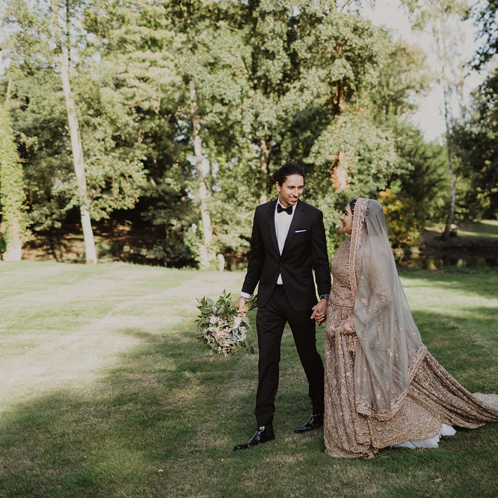 Bride and groom portrait holding hands by Phoebe Jane Photography 