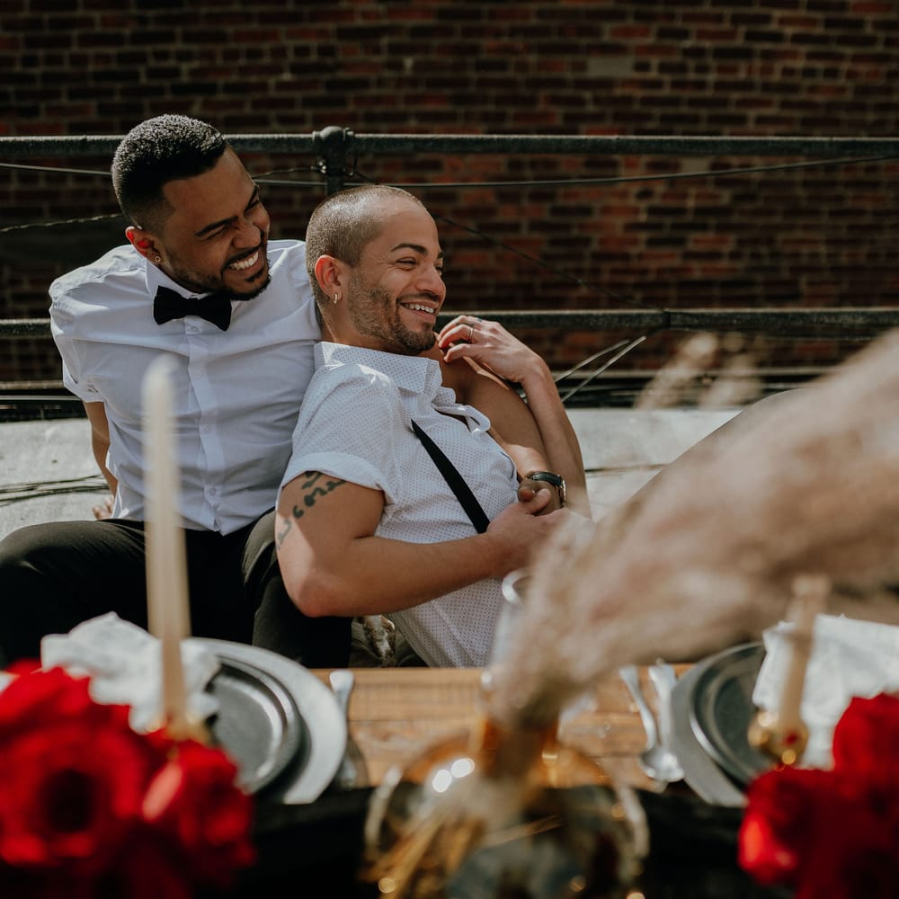 Grooms smile at intimate gay wedding New York