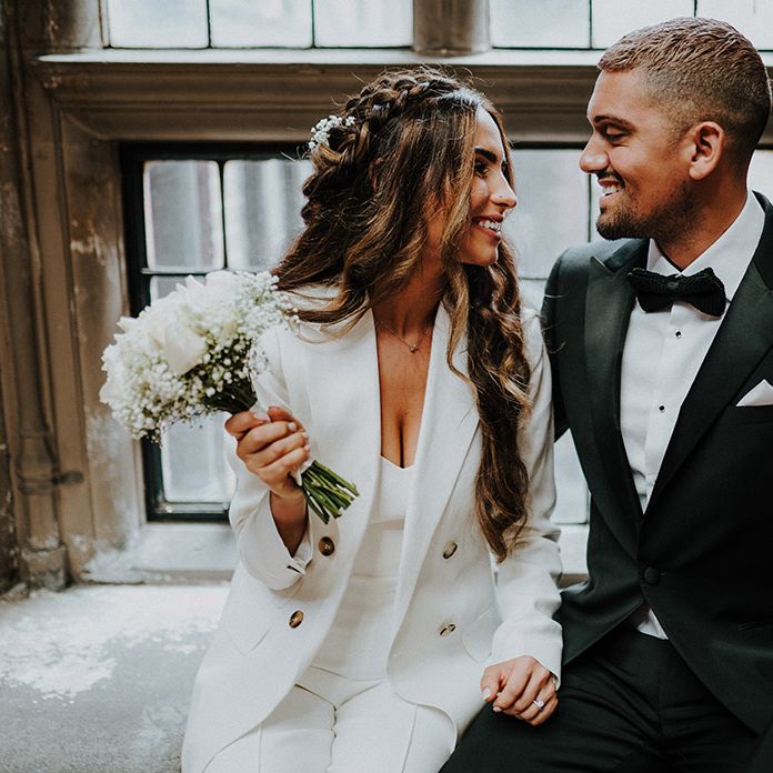 Bride and groom in black and white suits at intimate Sheffield registry office wedding 