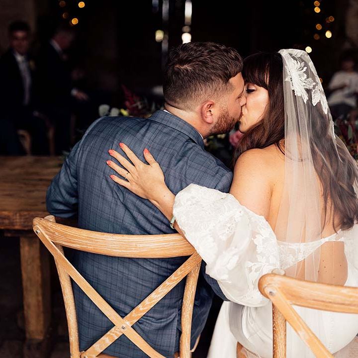 Bride & groom kiss on their wedding day 
