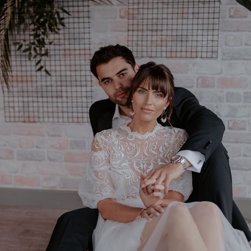 Bride in a tulle wedding dress with embroidered lace wedding dress 