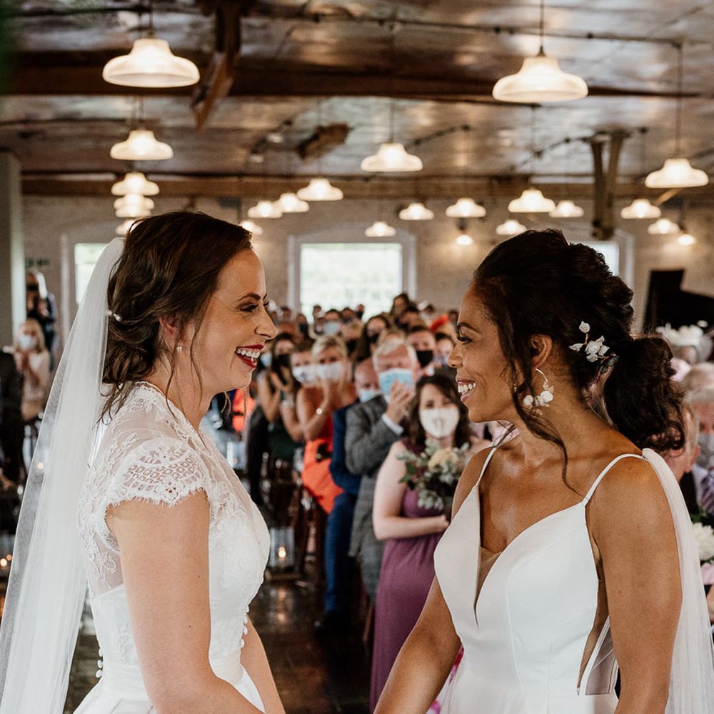 Two brides exchange vows at The West Mill Industrial wedding venue in Derby 