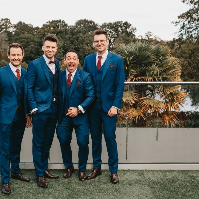 Groomsmen in navy suits at Millbridge Court autumn wedding