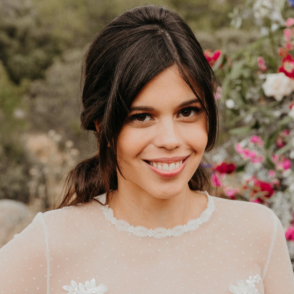 Dark haired bride wears her hair in relaxed style 