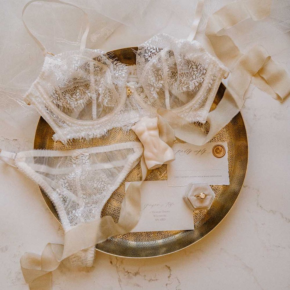 Lace lingerie set by Roisin Reuss on a gold platter 