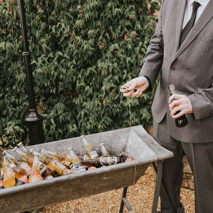 vintage ice troughs full of beer for the wedding guests to hydrate themselves with