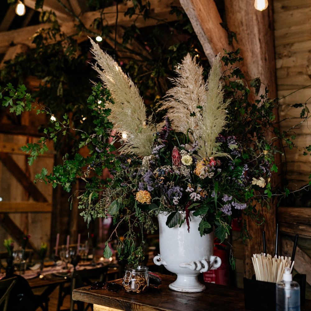 Floral arrangement with pampas grass