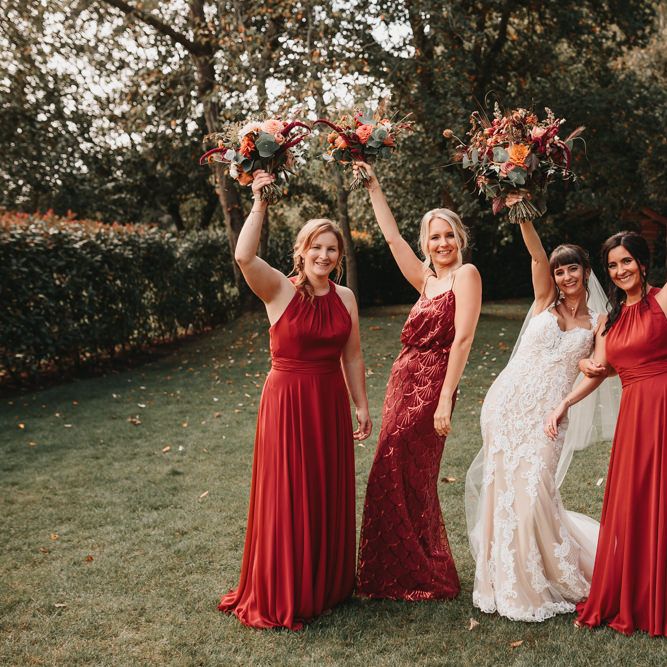 Bridesmaids in burgundy dresses at Millbridge Court wedding