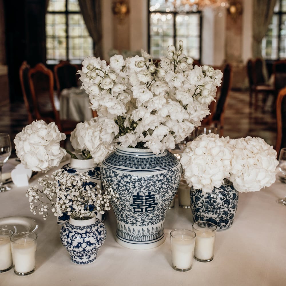 blue and white chinese pottery filled with white flowers for classic wedding in Austria 