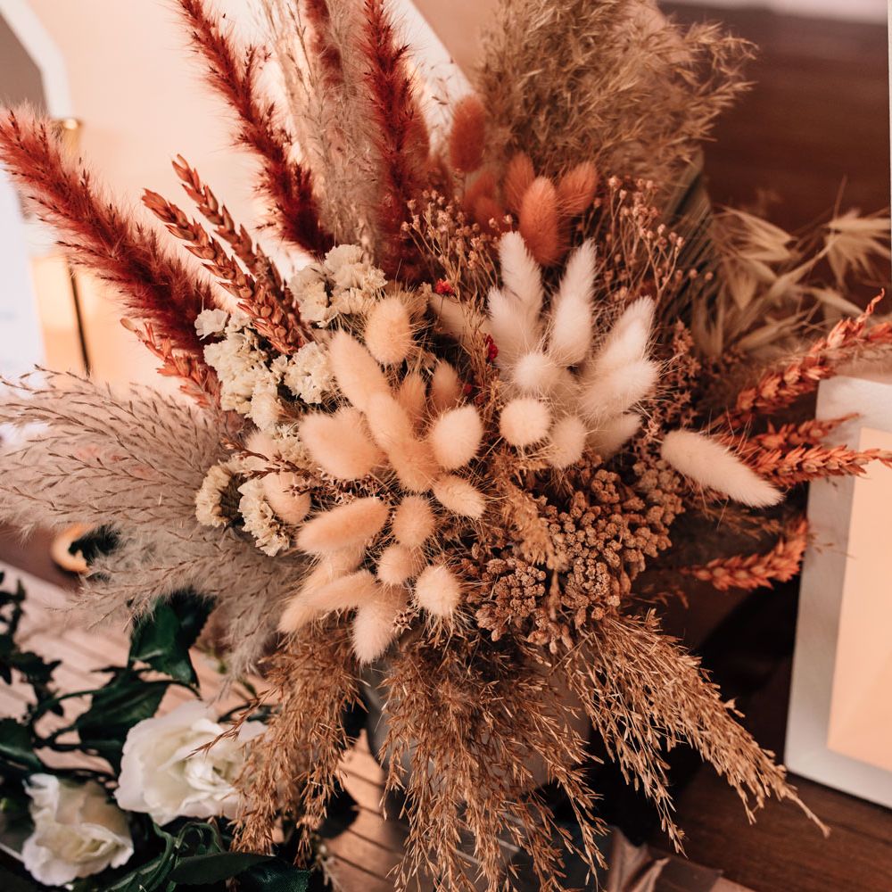 Dried wedding florals with pampas grass for rustic wedding reception