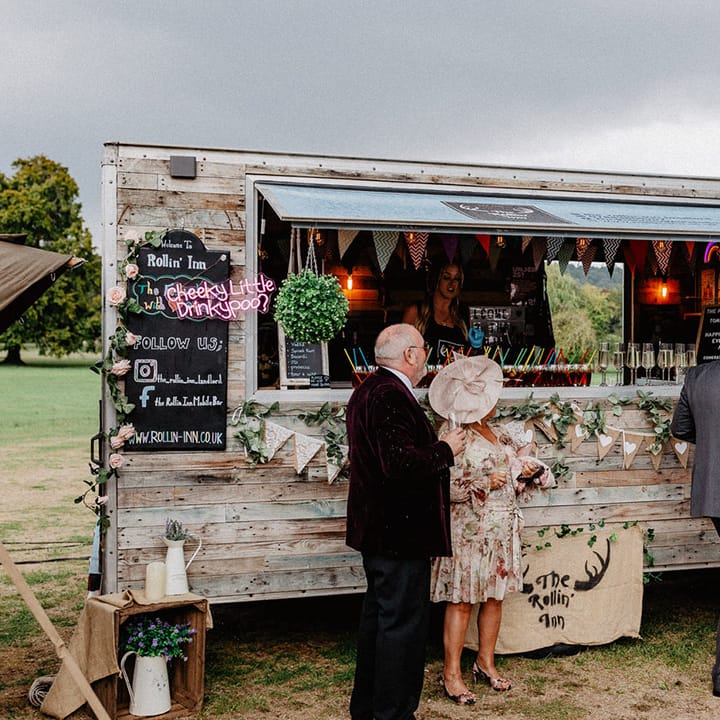 Outdoor wedding pub with alcoholic drinks for the wedding guests to enjoy