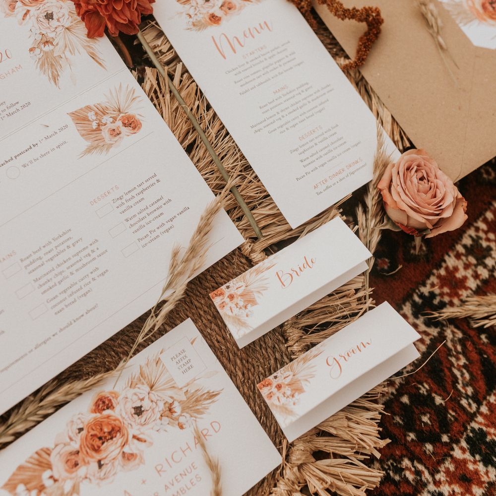 Stationery with floral theme in oranges 