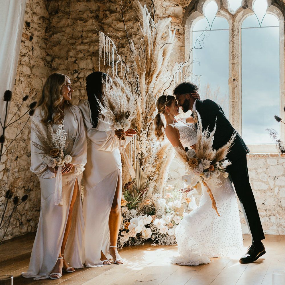 Modern luxury wedding inspiration with black tie fashion and neutral dried and fresh flower arrangements 