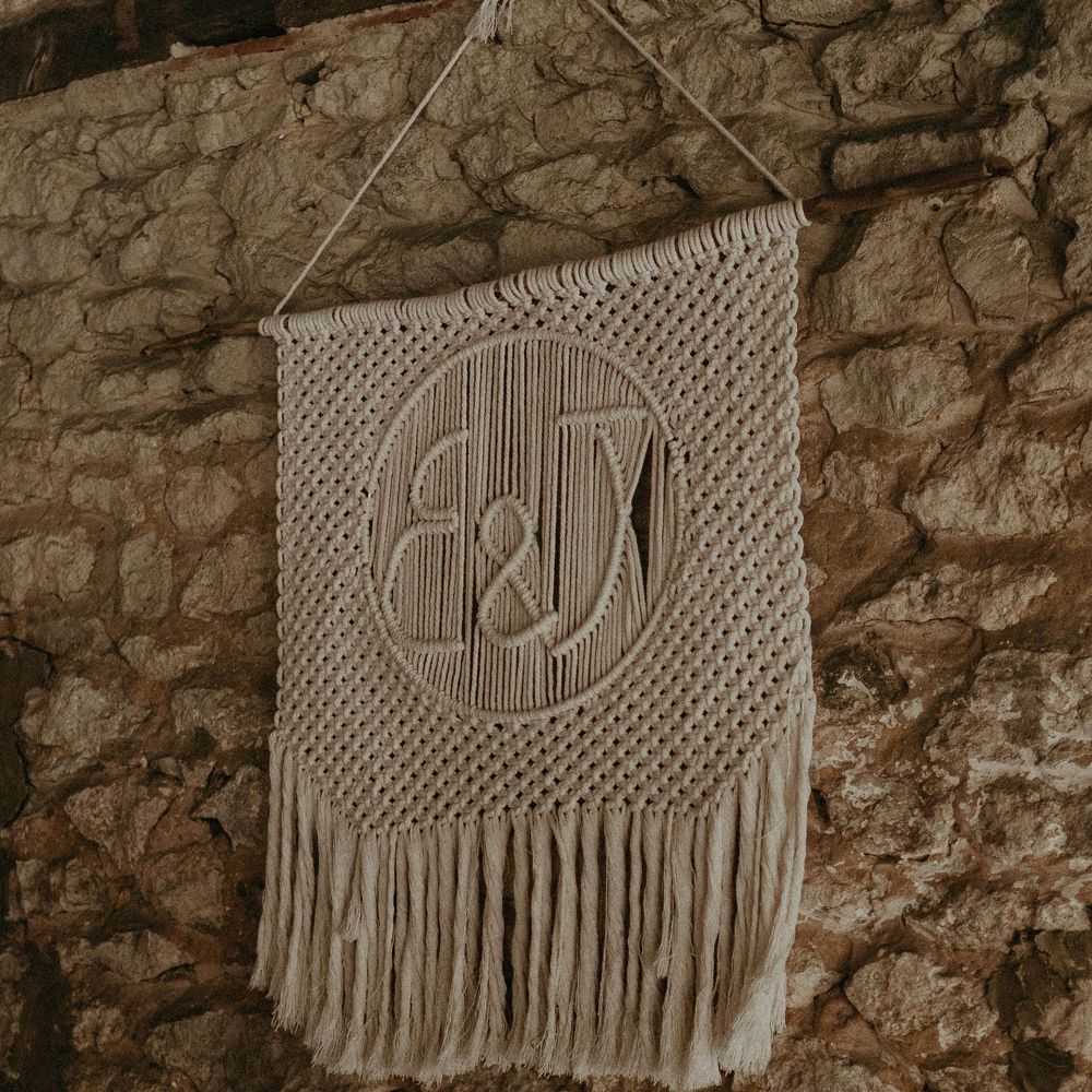 Macrame wedding wall hanging with E&J initials for Isle of Wight wedding