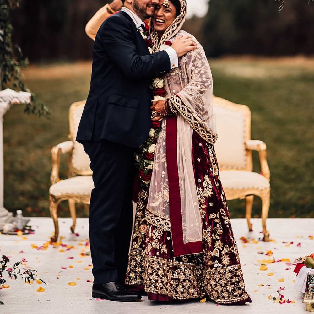 Bride wears iindian saree wedding dress & hugs groom at their Autumn wedding 