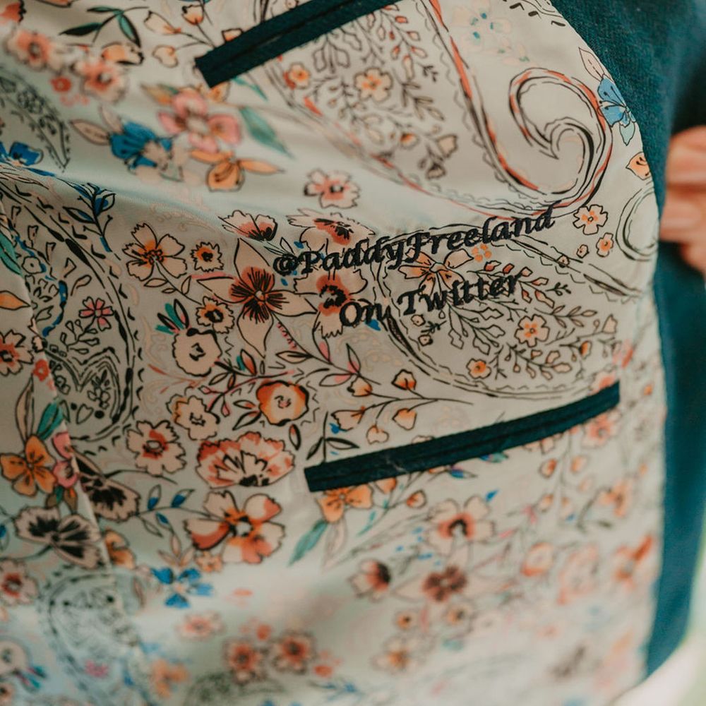 Bright design suit jacket with personalised embroidery to the inside 