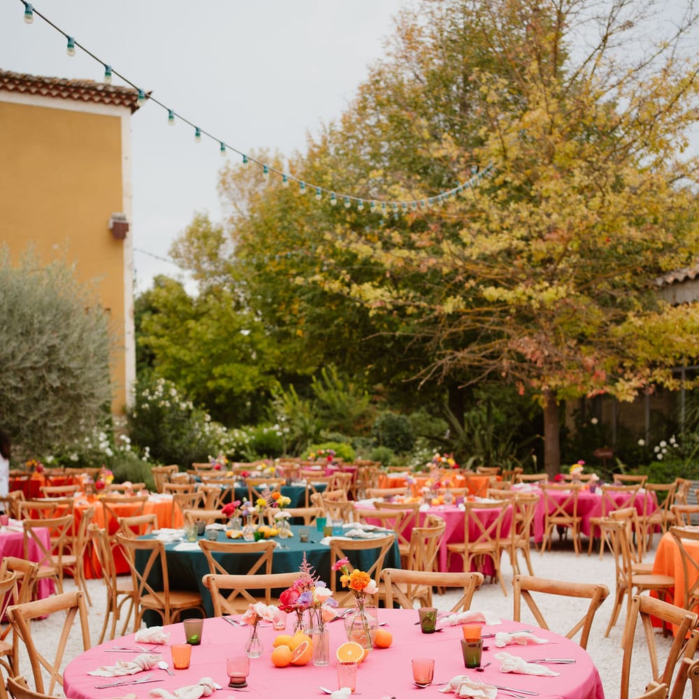 Outdoor destination wedding at Domaine de Blanche Fleur with fruit centrepiece decor
