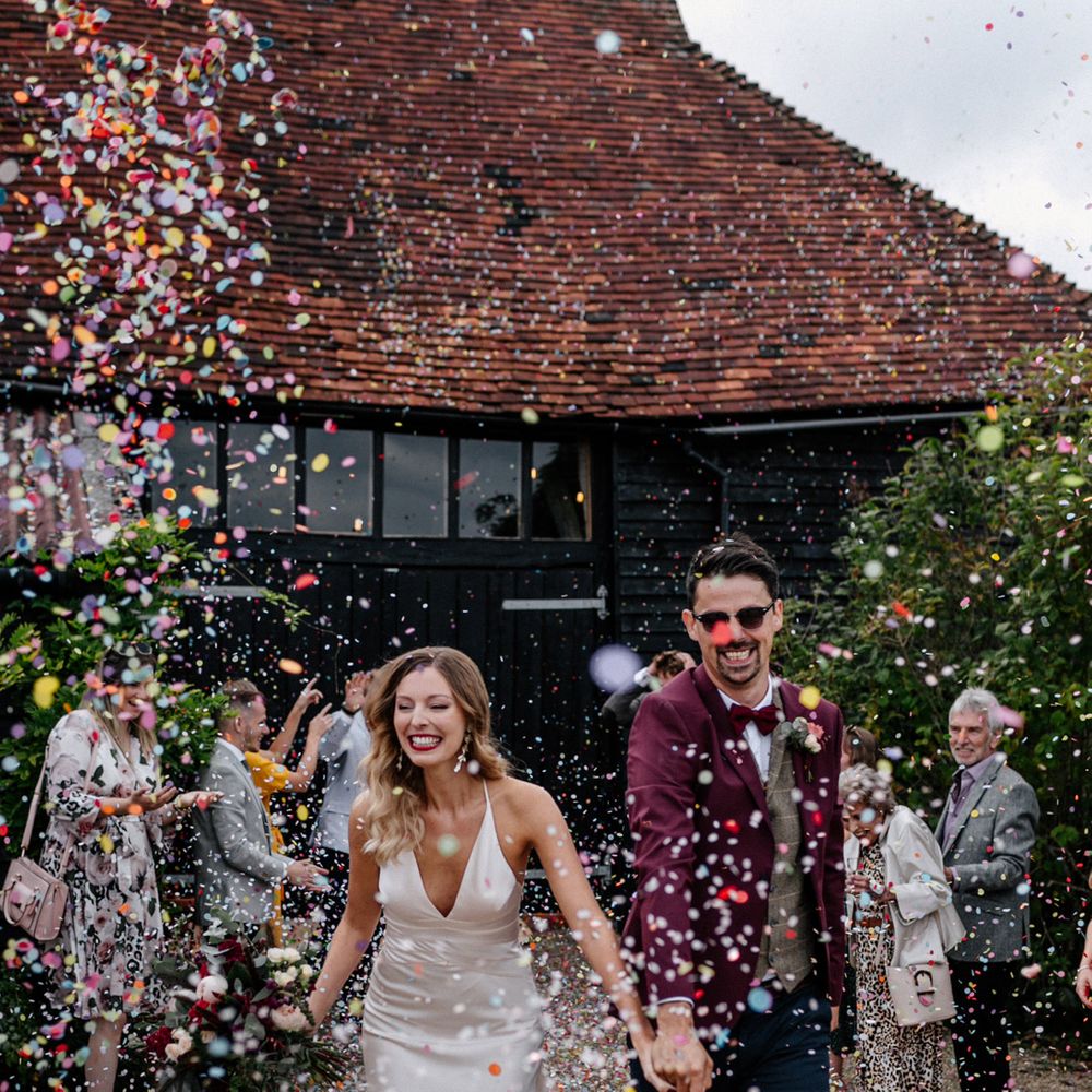 Confetti moment at High Billinghurst Farm by Epic Love Story