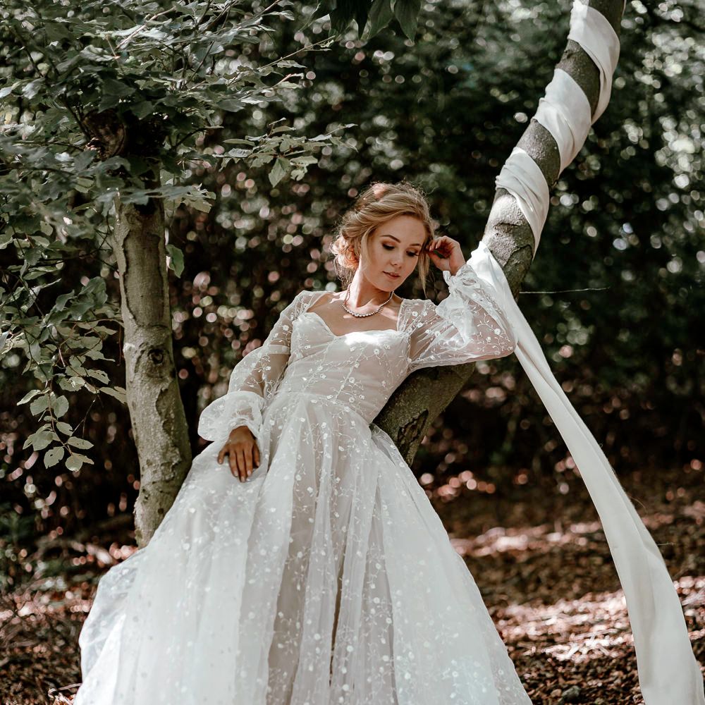 bride in bespoke wedding dress using fabric remnants 