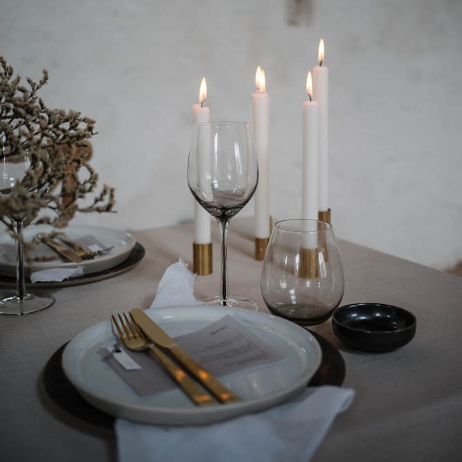 Place setting with gold cutlery 