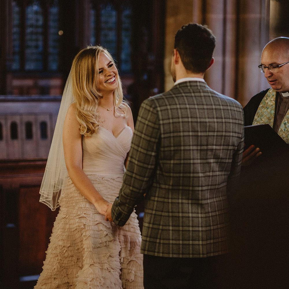 Bride in second hand wedding dress for church micro wedding