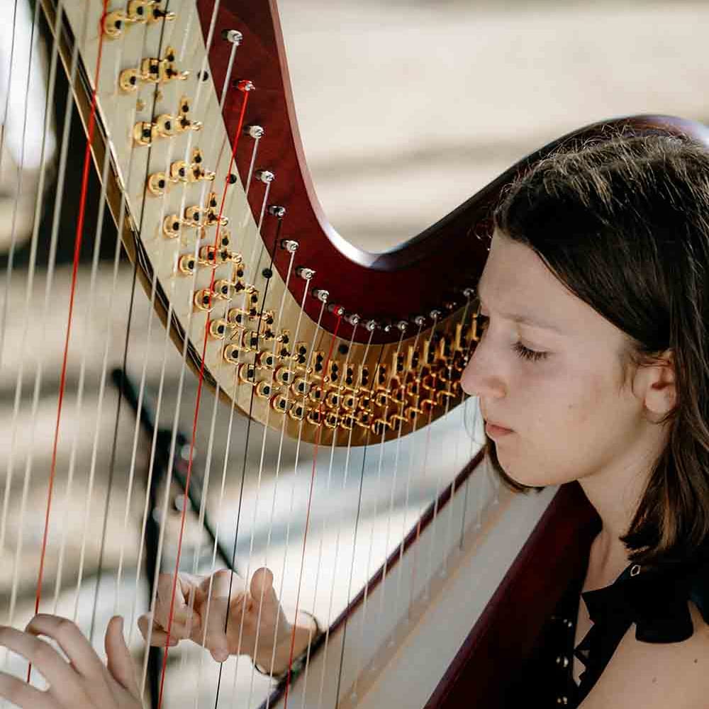 Harpist plays during romantic Italian wedding 