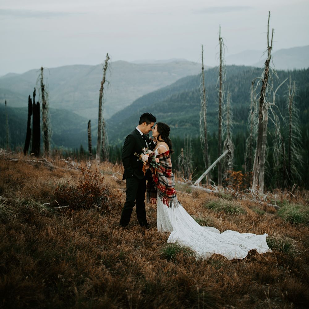 Bride & groom look lovingly into one another's eyes