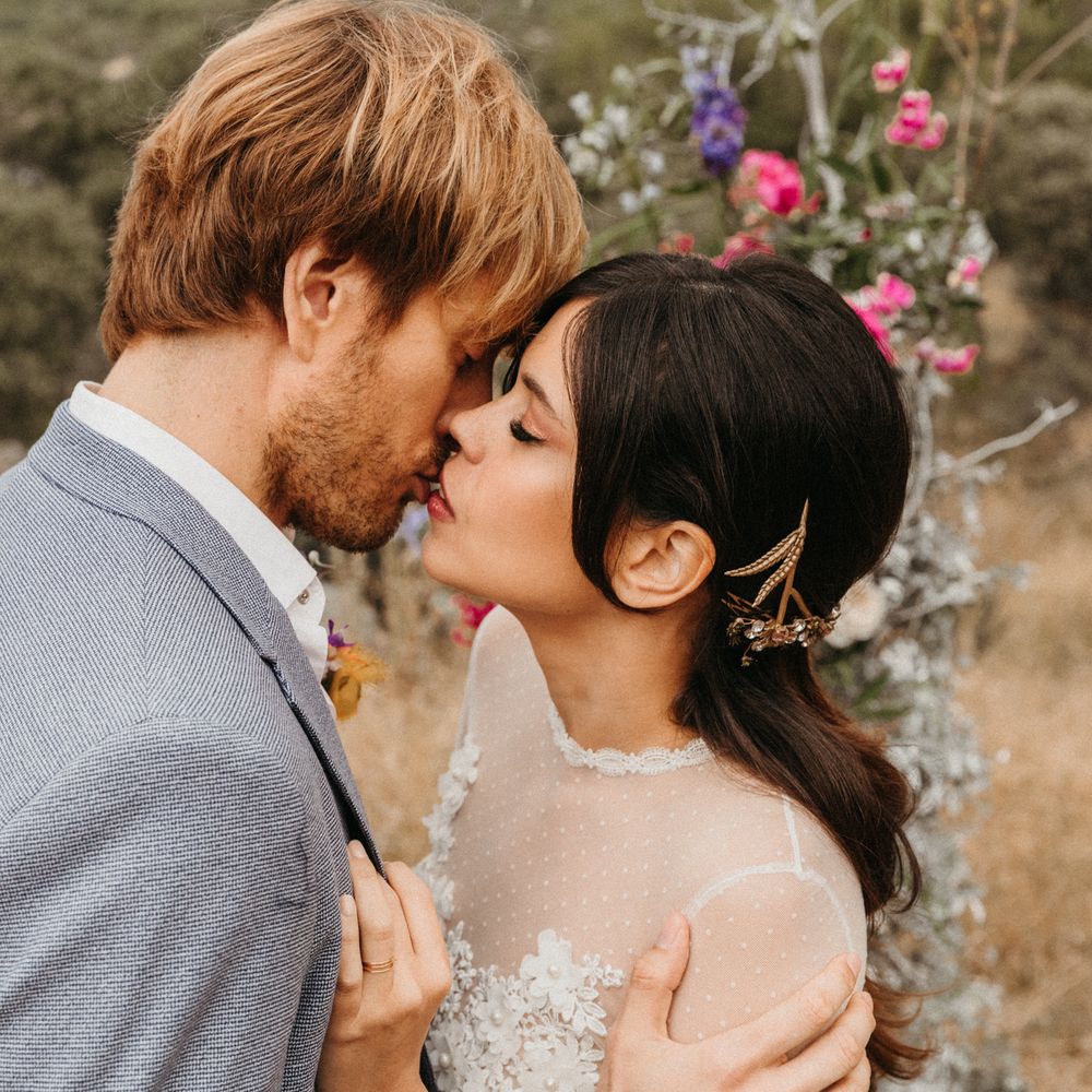 Bride & groom embrace during elopement in Madrid